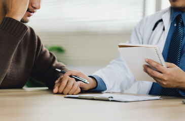 Close-up of psychiatrist hands together holding palm of his patient. Hands of patient  reassuring...