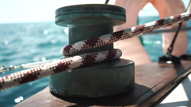 close up Detail yacht, rope on a metal block. the mechanism rotates to tension the cable. High quality FullHD footage