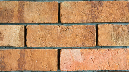 Naklejka premium Clay brick block structure wall surface. Interior decoration and background textured photo.