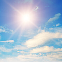Obraz na płótnie Canvas Blue sky with white clouds and sun.