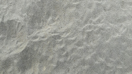 Naklejka premium sandy beach texture with wave pattern colorful.