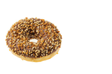 View of donut sprinkled with nuts isolated on white background.  Sweden.