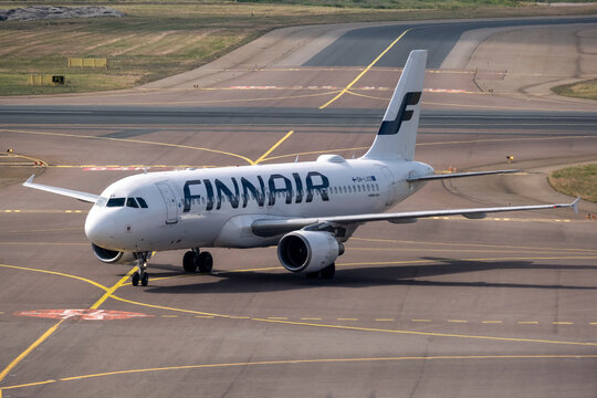 An Airbus A320, operated by the Finnish flag carrier Finnair, taxiing at Helsinki Airport