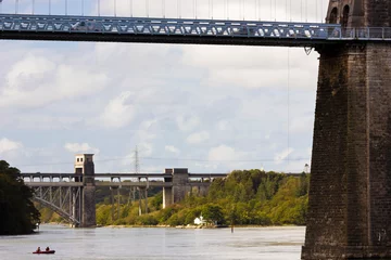 Foto op Canvas Beautiful view looking underneath the Menai Bridge and southwards along the Menai Strait towards the Britannia Bridge in the distance, Isle of Anglesey, North Wales © Liberty Photo Art