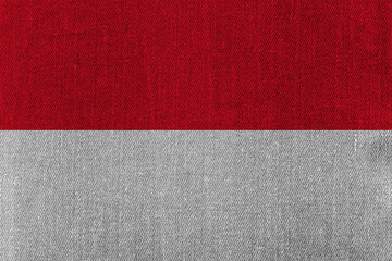 Patriotic classic denim background in colors of national flag. Indonesia