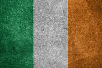 Fototapeta premium Old leather shabby background in colors of national flag. Ireland