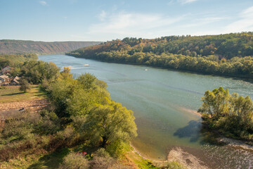 Beautiful natural scenery of river tropical green forest with hills in background, aerial view drone shot