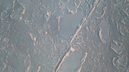 Top view of the texture of the icy sea surface