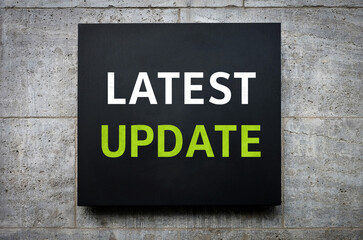 Obraz premium Latest Update - words on wall board