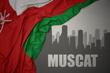 abstract silhouette of the city with text Muscat near waving national flag of oman on a gray background.3D illustration - obrazy, fototapety, plakaty