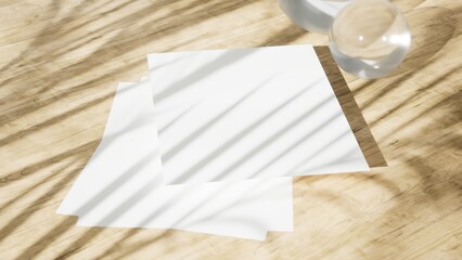 Mockup A4 paper on a wooden table, shadow of tropical plants