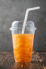 Cold icy drink with golden edible glitter or shimmer powder