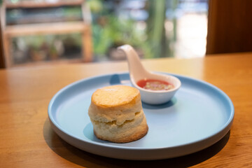 pieces of scones on blue plate at cafe