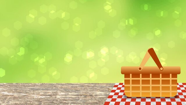 Picnic basket on wooden desk isolated on green blur in park. Picnic clothe and moving circles. concept for vacation, picnic and family time.