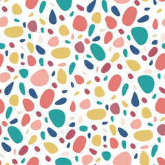 Abstract seamless pattern with colorful pebbles on white. Bright stone mosaic terrazzo background