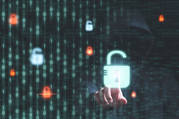 Man in dark hoodie touching to master key to unlock on binary code background for hacker in...