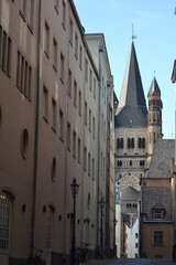 Fototapeta premium tower of the cologne town hall seen from a narrow alley