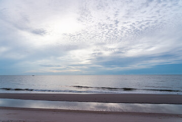 Fototapeta na wymiar Landscape of Ocean with Reflection of Sky in Morning