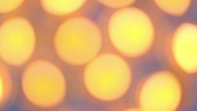 Blurred spots from candles, bright and beautiful background,  top view.