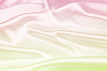 Colorful silk texture luxurious satin for abstract background, soft focus, pastel color
