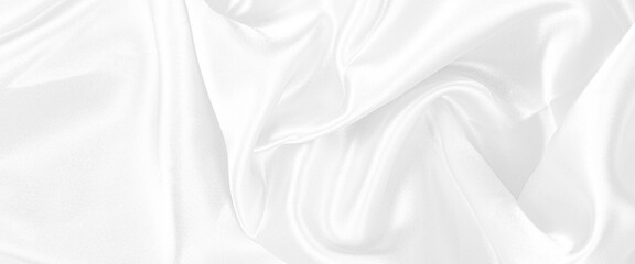 White silk or satin luxury fabric texture background