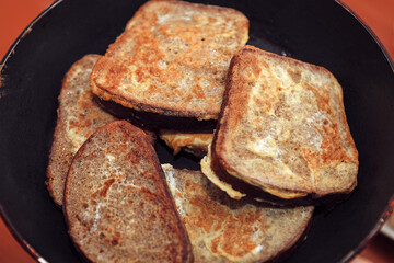 Fried Bread in Egg Batter . Cooking French Toast