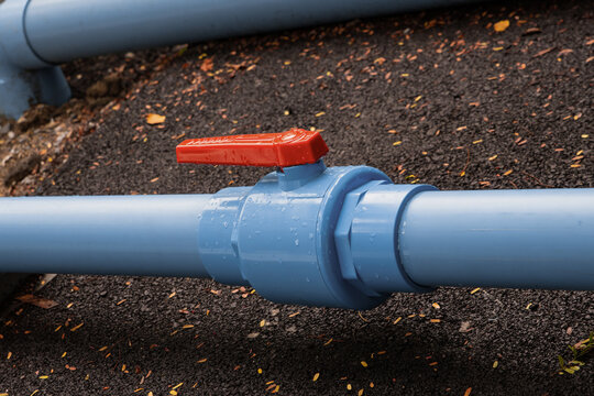 plastic water supply pipes with valve for adjustment close-up