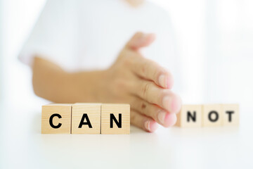 Positive thinking concept, man using a hands separated the word between 