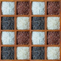 pattern of rice white and red in wooden cells background culinary
