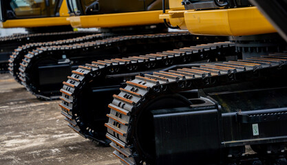 Details of hydraulicheavy duty equipment vehicle on display area of dealership