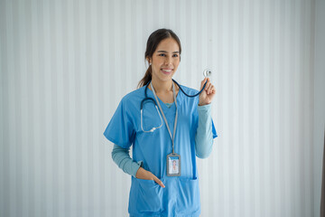 Smiling nurse woman with stethoscope in the office,Healthcare.