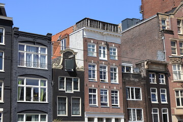 Amsterdam Nieuwezijds Voorburgwal Street Brick Building Facades View, Netherlands