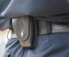 Formation of the Russian police squad rear view, side view. A policeman with a pistol holster,...