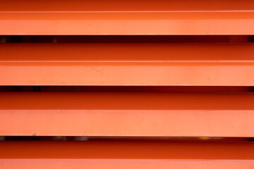 A horizontal image of red corrugated metal siding - 514817575