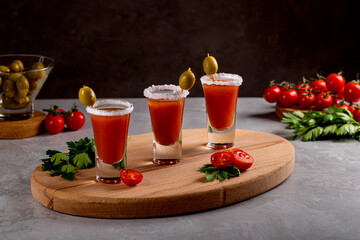 Shots with the alcoholic drink Bloody Mary.