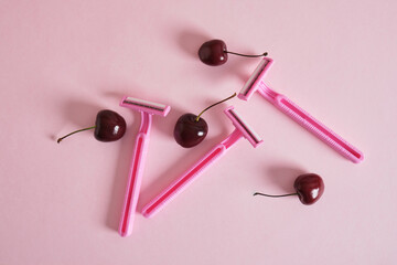 cherry berries and pink disposable razors for women