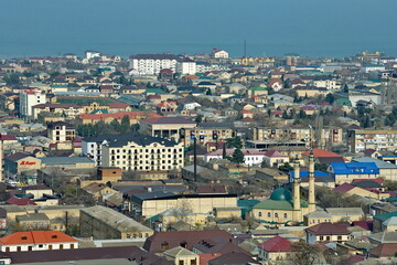 Obraz premium Derbent. Russia. April 09, 2021. Republic of Dagestan. View of the ancient city with a thousand-year history from the pre-Arab fortress of Naryn-Kara. The city of Derbent was founded in 438 AD.