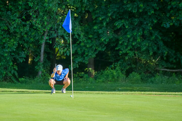 Junior golf on a beautiful day on the course
