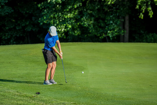 Junior golf on a beautiful day on the course