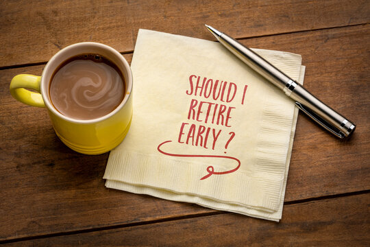 Should I retire early? Question handwritten on a napkin. Retirement planning concept.