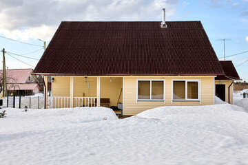 Snow drifts on front lawn as result of climate change, this is what global warming looks like.