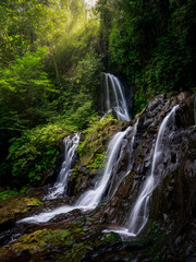 Fototapeta na wymiar tropical waterfall pengibul