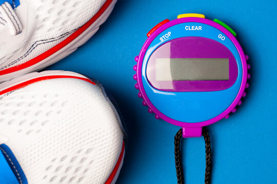 jogging shoes and stopp watch