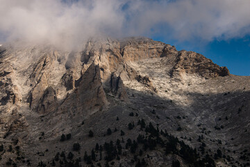 Landscape of the  Olympus Range mountains. View of a high rocky peaks and deep gorges. The highest peak, Mytikas. It is highest mountains in Greece. National Park. World Biosphere Reserve. Europe.