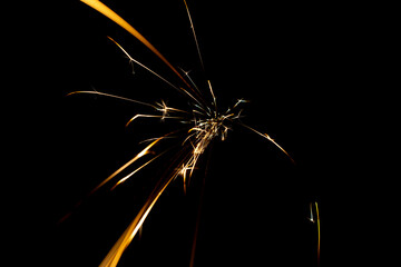sparks in the dark. lines of light.