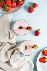 Healthy smoothie with strawberries and mint in glasses. Homemade dessert. Top and vertical view