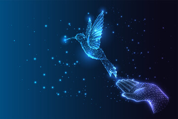 Futuristic concept of dream, hope, freedom, inspiration with hand and flying bird hummingbird 