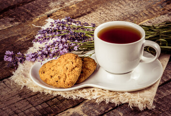 Cup of tea with lavender and cookies