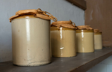 Old clay storage jars on a shelf