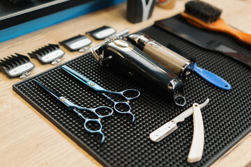 Barbershop, close-up: haircut equipment, scissors and razors